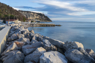 Winter sunset over the bay of portopiccolo sistiana. duino. italy