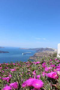 Scenic view of sea against blue sky