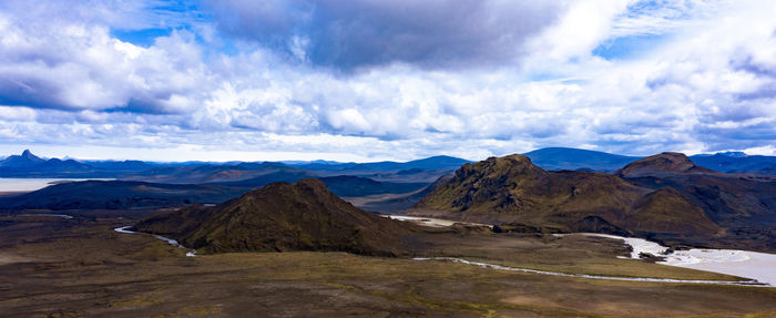 Panoramic view of landscape and mountains against sky
