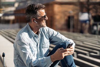 Young man looking away outdoors