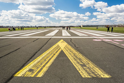 People at airport runway