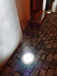 High angle view of illuminated lamp on floor