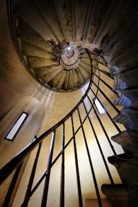 Low angle view of spiral staircase of building