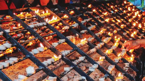 High angle view of fire on barbecue grill