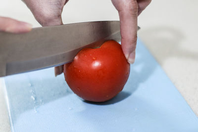 Close-up of man preparing food