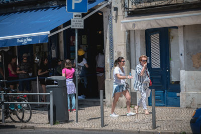 Group of people in front of building