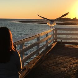 Scenic view of sea at sunset