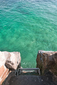 High angle view of swimming pool by sea