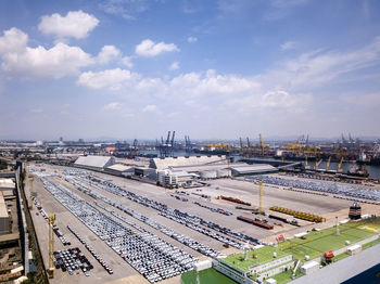 High angle view of railroad tracks in city against sky