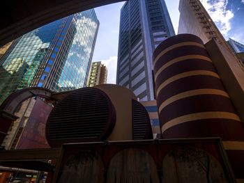 Low angle view of modern buildings against sky