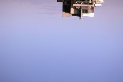 Low angle view of building against blue sky