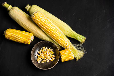 High angle view of yellow vegetables on table