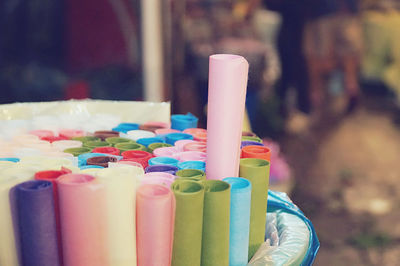 Close-up of rolled papers in bag for sale at market