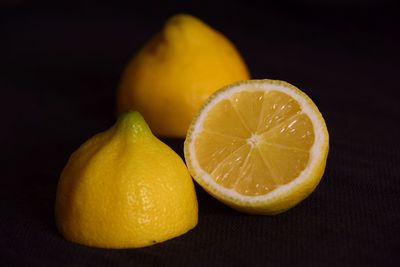 Close-up of oranges against orange background