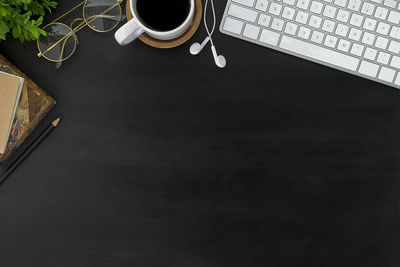 High angle view of coffee cup on table