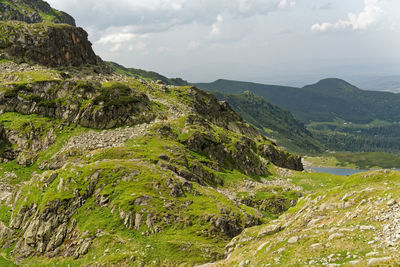 Scenic view of tree mountains against sky