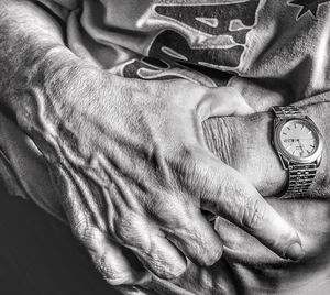 Close-up of man wearing wristwatch