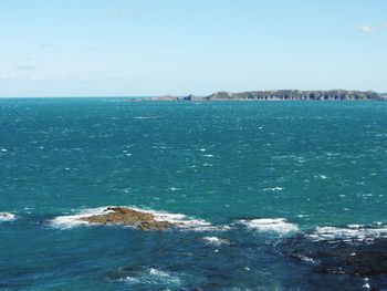 View of calm blue sea against sky