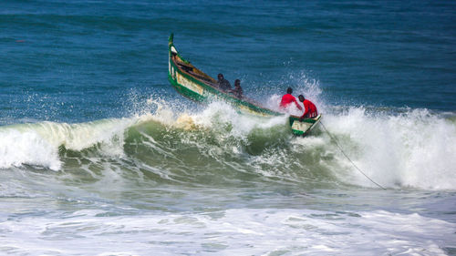 Man surfing in sea