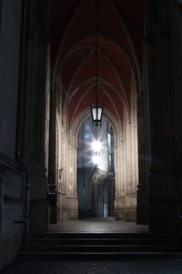 Sunlight streaming through corridor of building