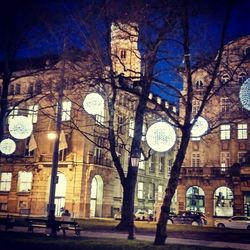 Illuminated street light in city