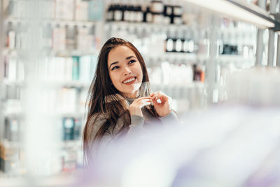 Portrait of smiling young woman