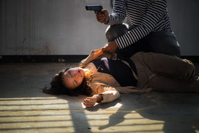 Couple lying down on floor