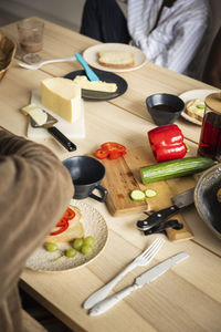 Breakfast foods on wooden table