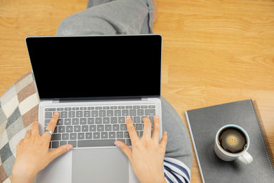 Low section of person working on table