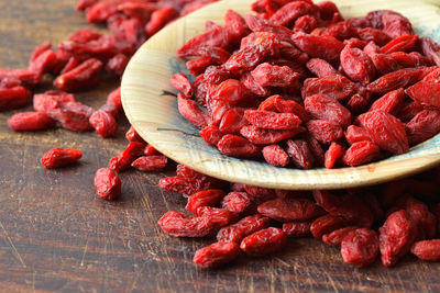 High angle view of goji berries on table