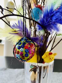 Close-up of multi colored flowers in vase