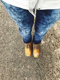 Low section of man standing on floor