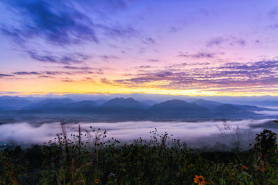 Scenic view of lake against sky during sunset