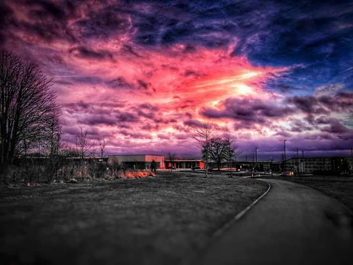 sky, sunset, cloud - sky, road, transportation, nature, dramatic sky, no people, tree, direction, beauty in nature, the way forward, dusk, bare tree, scenics - nature, architecture, city, street, outdoors, tranquility, surface level