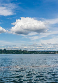 Clouds that look like cotton candy hang over the puget sound in washington state.