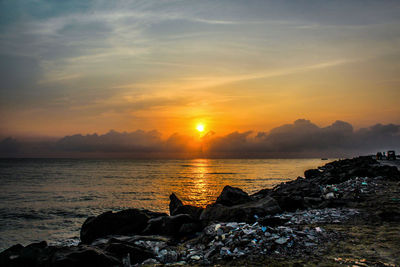 Scenic view of sea against sky during sunset