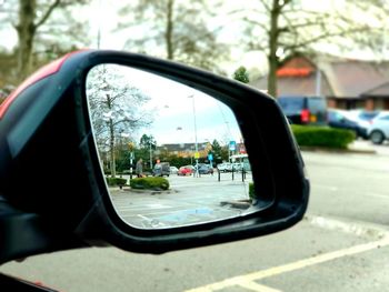 Reflection of road on side-view mirror