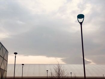Low angle view of street light against sky