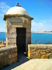 View of fort against sea