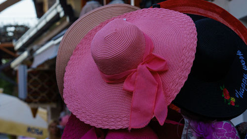 Rear view of woman with pink hat