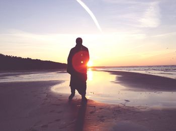 Scenic view of sea at sunset