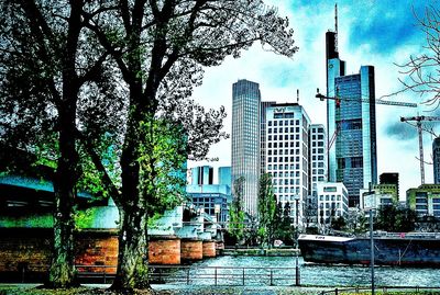 Buildings in city against sky