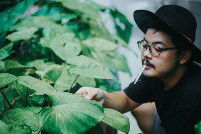 Young man looking away outdoors