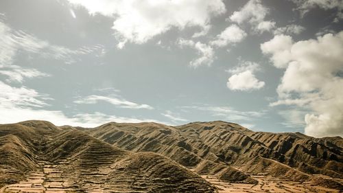 View of landscape against cloudy sky