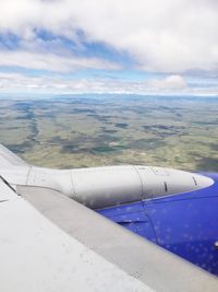 Aerial view of airplane flying over sea