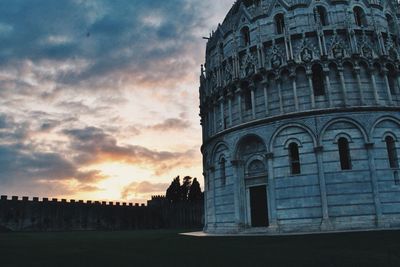 Piazza dei miracoli against sky during sunset