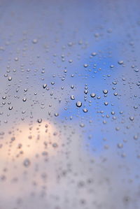 Full frame shot of wet glass window