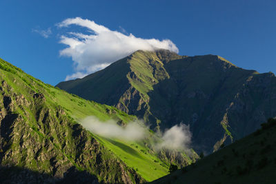 Panoramic view of mountains against sky