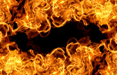 Close-up of fire crackers against black background