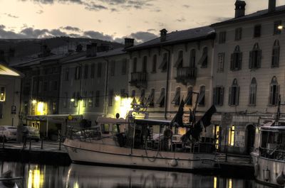 Reflection of illuminated buildings in water